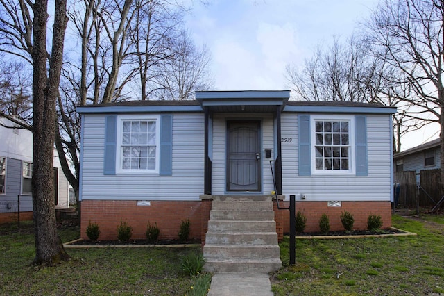 2919 W 27th St, Little Rock, AR 72204 - view of front of home with a front lawn and crawl space