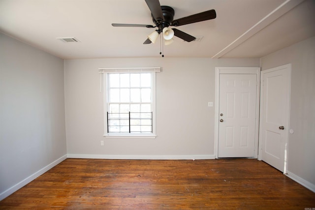2919 W 27th St, Little Rock, AR 72204 - unfurnished room featuring ceiling fan, baseboards, visible vents, and wood finished floors