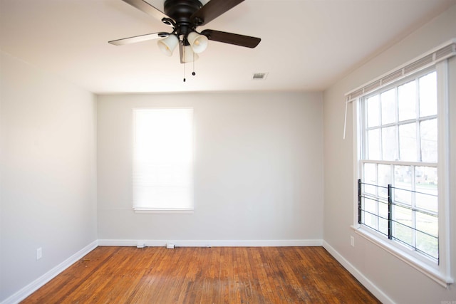 2919 W 27th St, Little Rock, AR 72204 - spare room featuring visible vents, baseboards, and hardwood / wood-style floors
