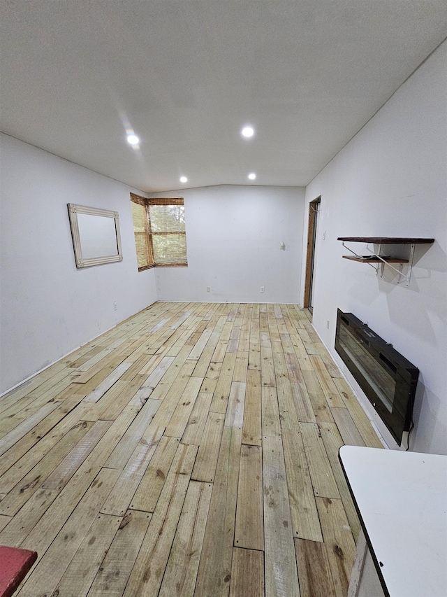 interior space with recessed lighting and wood-type flooring