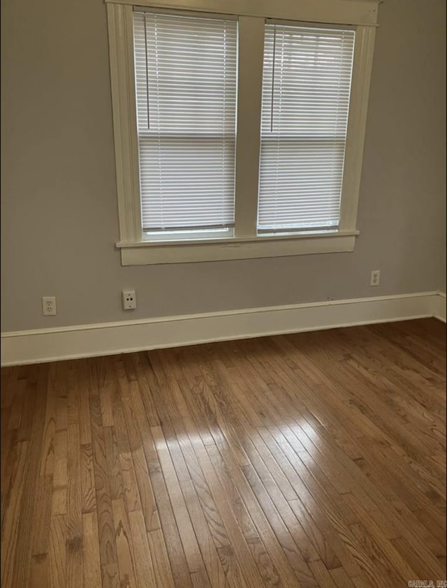 315 W 22nd St, Little Rock, AR 72206 - unfurnished room featuring baseboards and hardwood / wood-style flooring