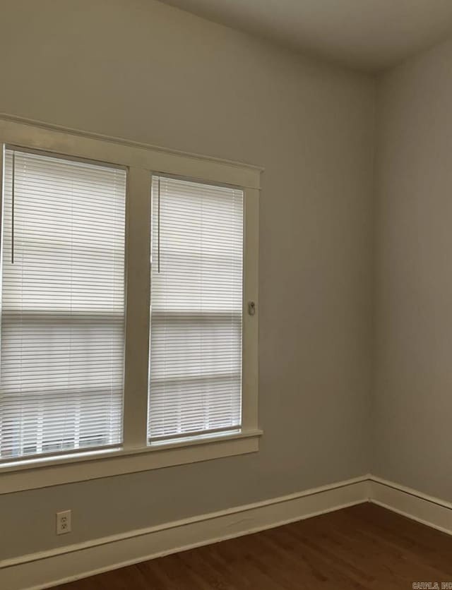 315 W 22nd St, Little Rock, AR 72206 - spare room with dark wood-style flooring and baseboards