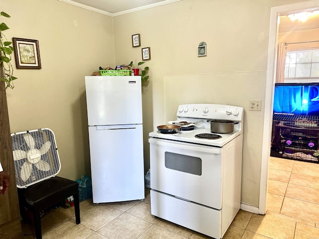 3120 Race St, Jonesboro, AR 72401 - kitchen with light tile patterned floors, white appliances, and ornamental molding