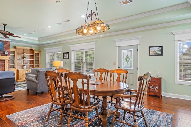 199 Gleneagle Loop, Hot Springs, AR 71913 - dining area featuring crown molding, visible vents, a ceiling fan, and hardwood / wood-style flooring
