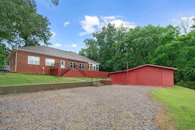 199 Gleneagle Loop, Hot Springs, AR 71913 - view of front of property with stairs, a front yard, an outdoor structure, and brick siding