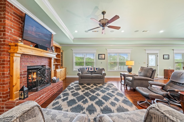 199 Gleneagle Loop, Hot Springs, AR 71913 - living area with a wealth of natural light, a brick fireplace, ceiling fan, and wood finished floors