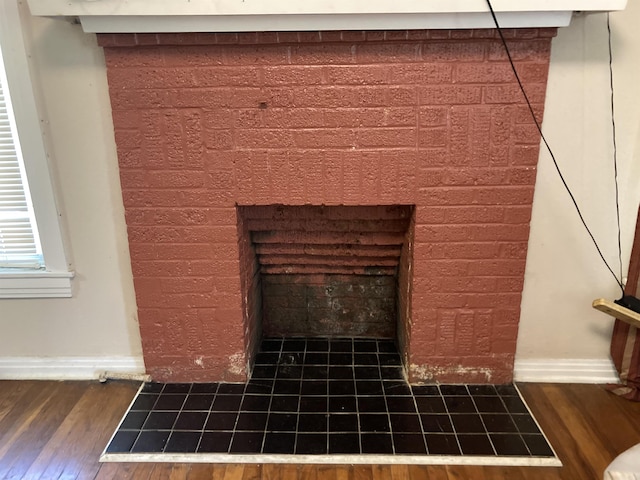 207 11th St, Mena, AR 71953 - detailed view of wood finished floors and baseboards