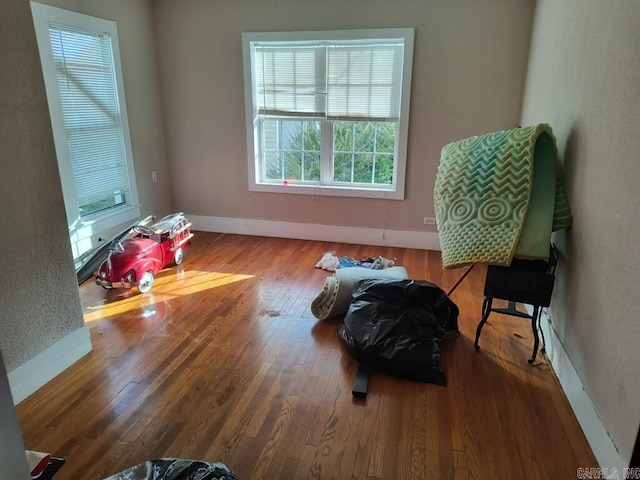 207 11th St, Mena, AR 71953 - unfurnished room featuring wood finished floors and baseboards