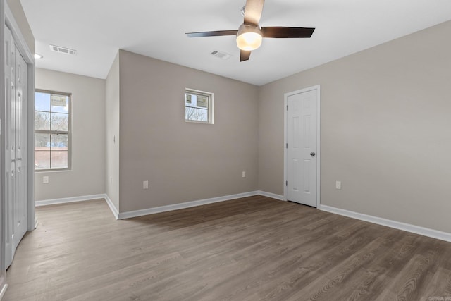 1914 Dennison St, Little Rock, AR 72202 - spare room with baseboards, light wood finished floors, visible vents, and a ceiling fan