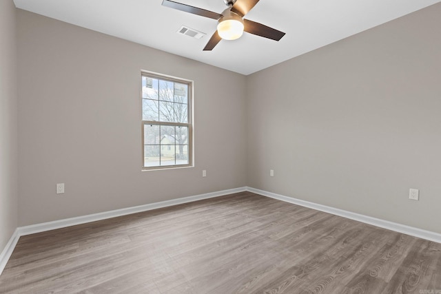 1914 Dennison St, Little Rock, AR 72202 - empty room featuring baseboards, visible vents, wood finished floors, and a ceiling fan