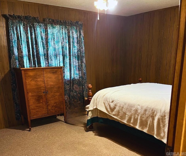 1300 Overdene St, Corning, AR 72422 - bedroom featuring wood walls and carpet