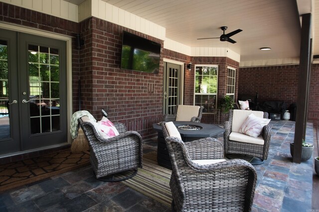 102 Cordell Rd, Beebe, AR 72012 - view of patio with an outdoor living space with a fire pit, french doors, and a ceiling fan