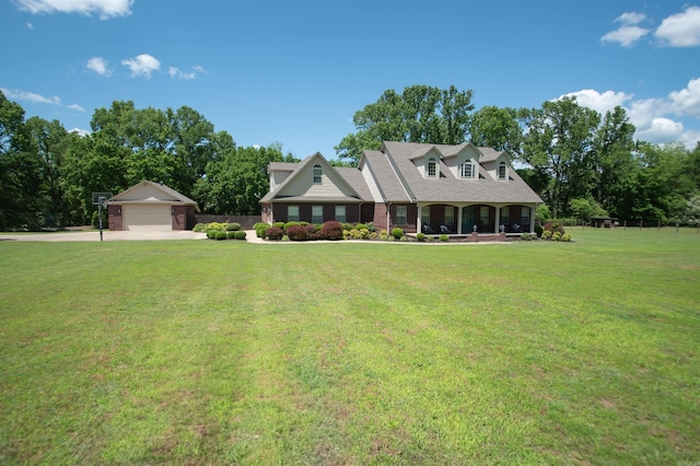 102 Cordell Rd, Beebe, AR 72012 - new england style home featuring covered porch, a garage, fence, concrete driveway, and a front yard