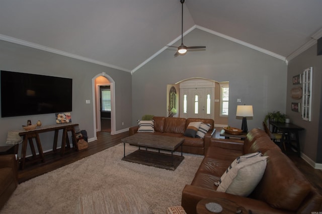 102 Cordell Rd, Beebe, AR 72012 - living area featuring wood finished floors, baseboards, lofted ceiling, and arched walkways