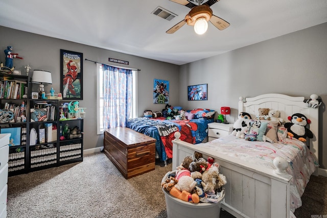 carpeted bedroom featuring baseboards, visible vents, and a ceiling fan