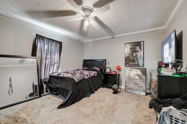 carpeted bedroom with crown molding and ceiling fan