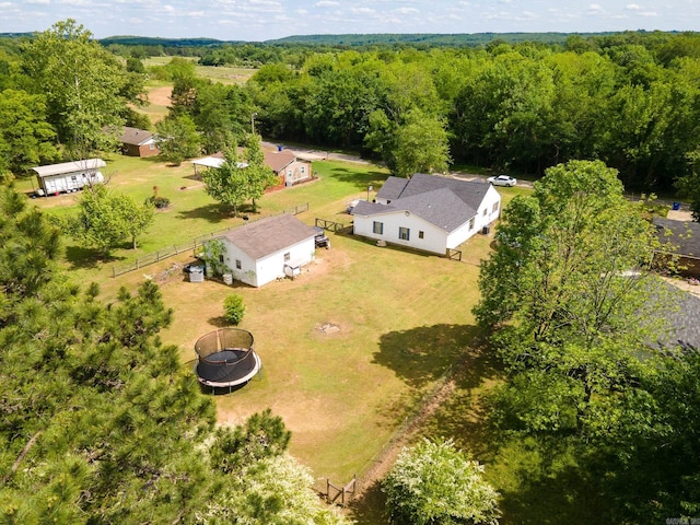 aerial view featuring a view of trees