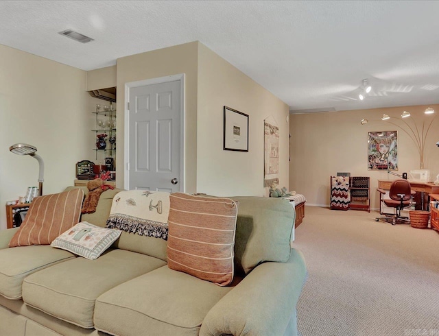 living room with light colored carpet and visible vents