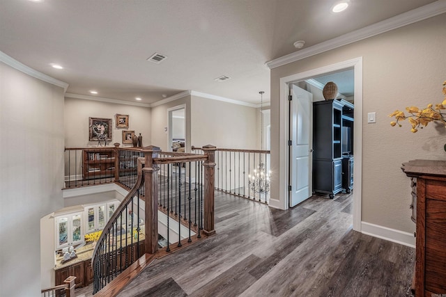 74 Greystone Blvd, Cabot, AR 72023 - hallway with baseboards, an upstairs landing, visible vents, and wood finished floors