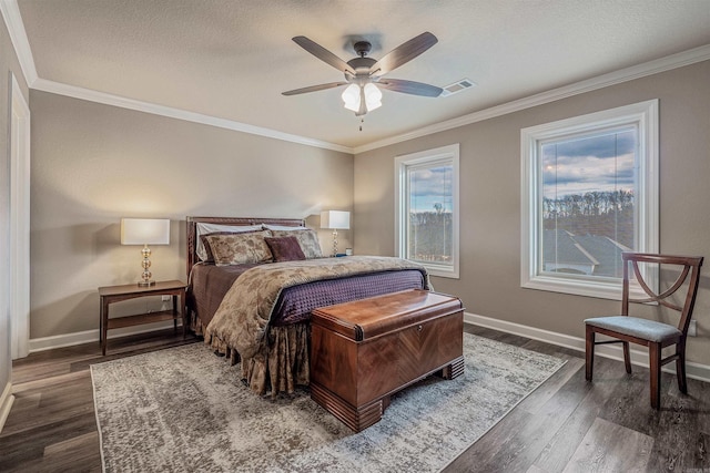 74 Greystone Blvd, Cabot, AR 72023 - bedroom featuring visible vents, crown molding, a ceiling fan, dark wood-style floors, and baseboards
