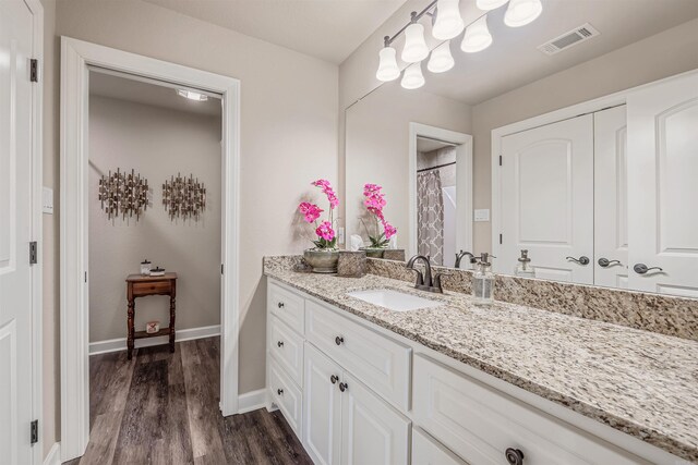 74 Greystone Blvd, Cabot, AR 72023 - full bath featuring vanity, visible vents, wood finished floors, and baseboards