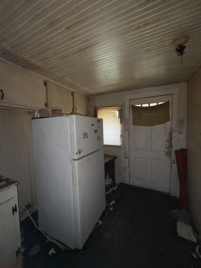 interior space with freestanding refrigerator