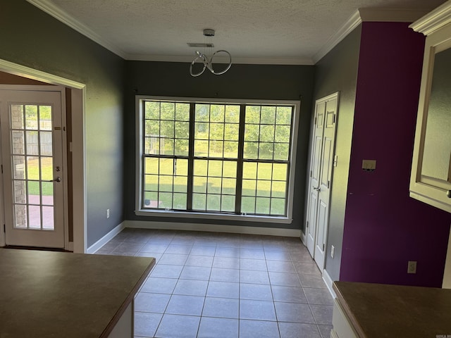1360 Champions, Conway, AR 72034 - unfurnished dining area with ornamental molding, tile patterned flooring, a textured ceiling, and baseboards