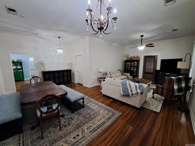 320 E 4th St, Lonoke, AR 72086 - living area with a ceiling fan, attic access, baseboards, dark wood finished floors, and visible vents