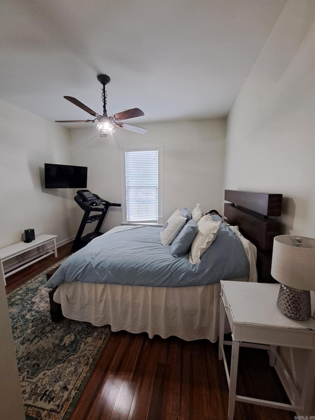 320 E 4th St, Lonoke, AR 72086 - bedroom featuring a ceiling fan and wood finished floors