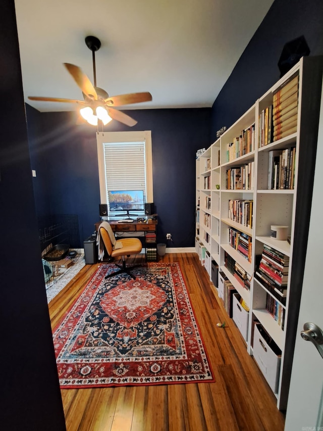 320 E 4th St, Lonoke, AR 72086 - sitting room with a ceiling fan and wood finished floors
