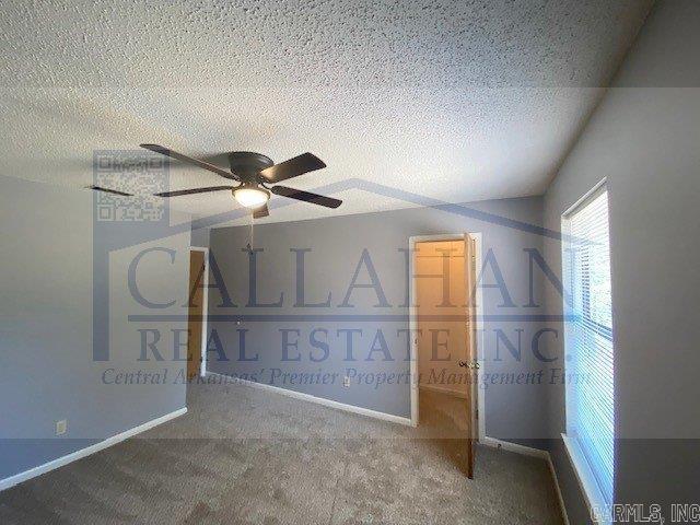 5732 Camp Robinson Rd, North Little Rock, AR 72118 - bonus room featuring baseboards, carpet floors, ceiling fan, and a textured ceiling