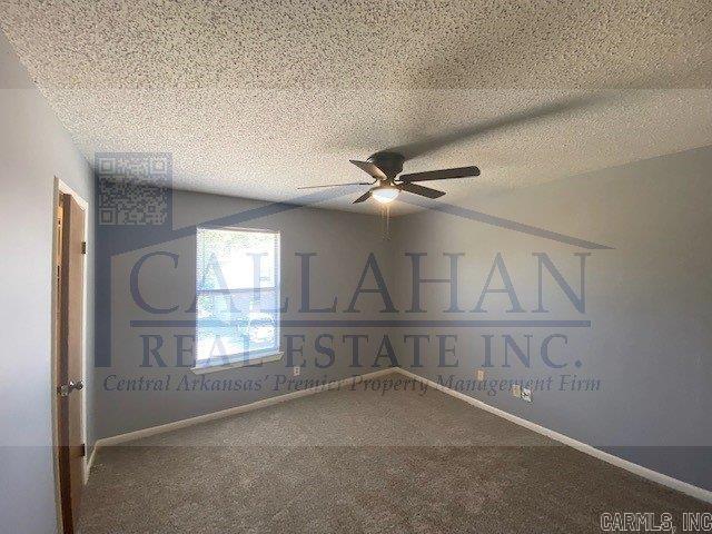 5732 Camp Robinson Rd, North Little Rock, AR 72118 - carpeted spare room featuring a textured ceiling and a ceiling fan