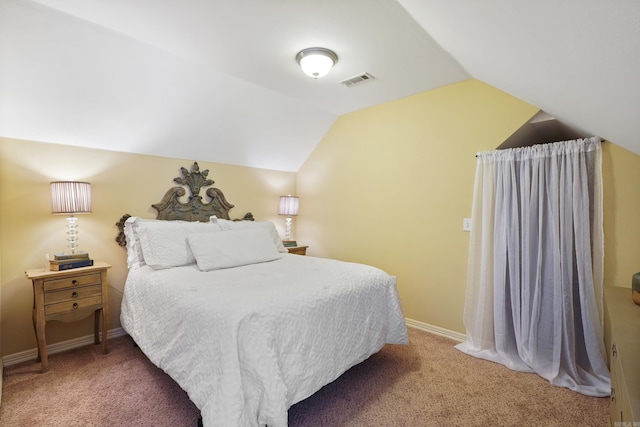 bedroom featuring vaulted ceiling, carpet flooring, baseboards, and visible vents
