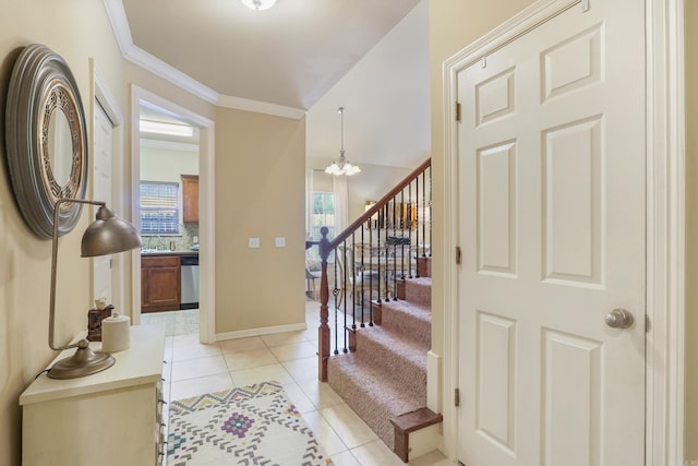 foyer featuring baseboards, an inviting chandelier, light tile patterned flooring, stairs, and crown molding