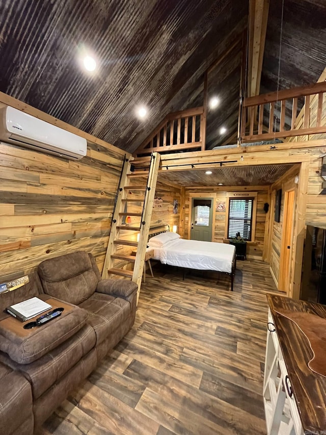 892 Hwy 375 E, Mena, AR 71953 - bedroom with wood walls, high vaulted ceiling, a wall mounted air conditioner, and wood finished floors