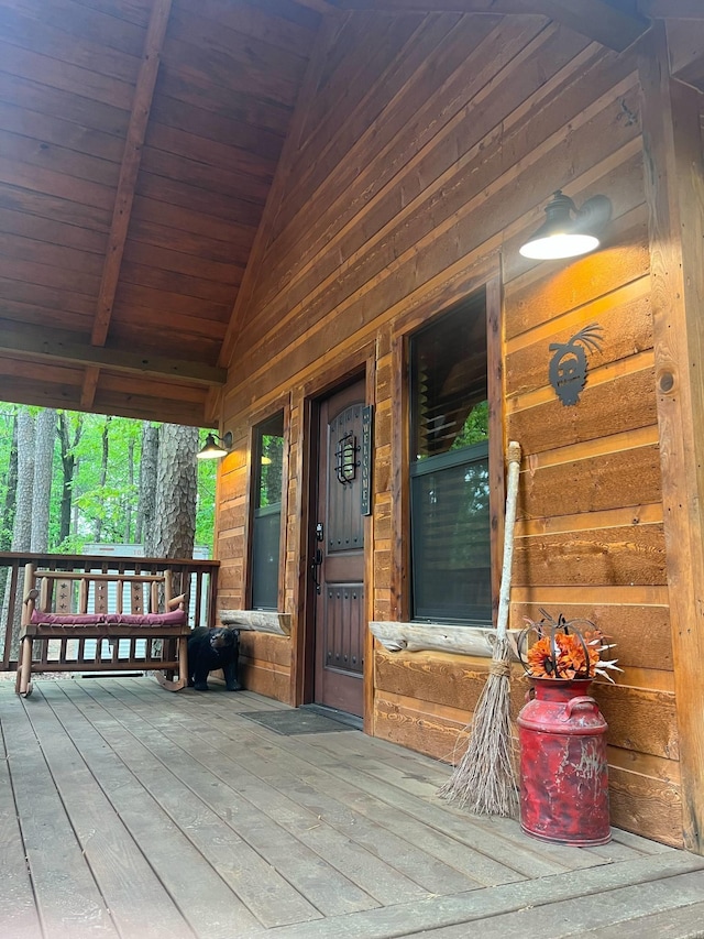 892 Hwy 375 E, Mena, AR 71953 - wooden deck with a porch