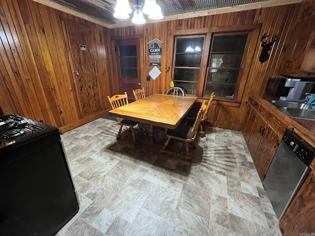 892 Hwy 375 E, Mena, AR 71953 - dining area with a chandelier and wooden walls