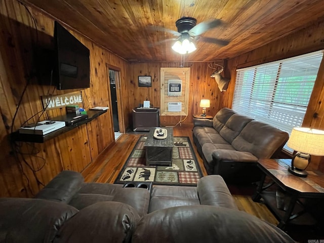 892 Hwy 375 E, Mena, AR 71953 - living room with ceiling fan, wooden walls, wood ceiling, and wood finished floors