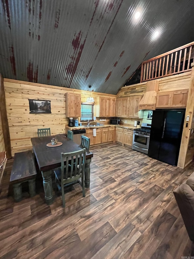 892 Hwy 375 E, Mena, AR 71953 - kitchen with stainless steel appliances, dark wood-style flooring, light brown cabinets, and custom range hood