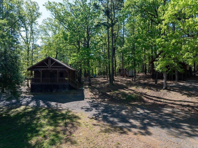 892 Hwy 375 E, Mena, AR 71953 - view of yard featuring covered porch