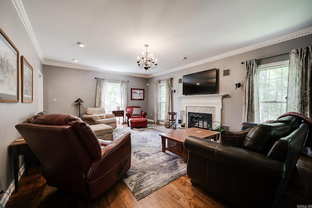 1494 N Miller Point Rd, Quitman, AR 72131 - living room featuring an inviting chandelier, crown molding, a high end fireplace, and wood finished floors