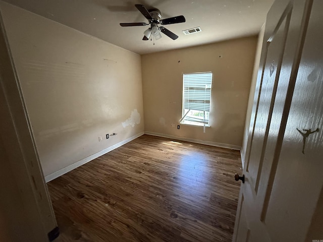 13506 Dynasty Dr, Alexander, AR 72002 - unfurnished bedroom with baseboards, ceiling fan, visible vents, and wood finished floors