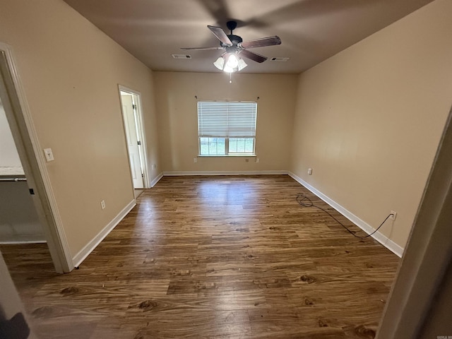 13506 Dynasty Dr, Alexander, AR 72002 - spare room featuring a ceiling fan, visible vents, and dark wood-type flooring