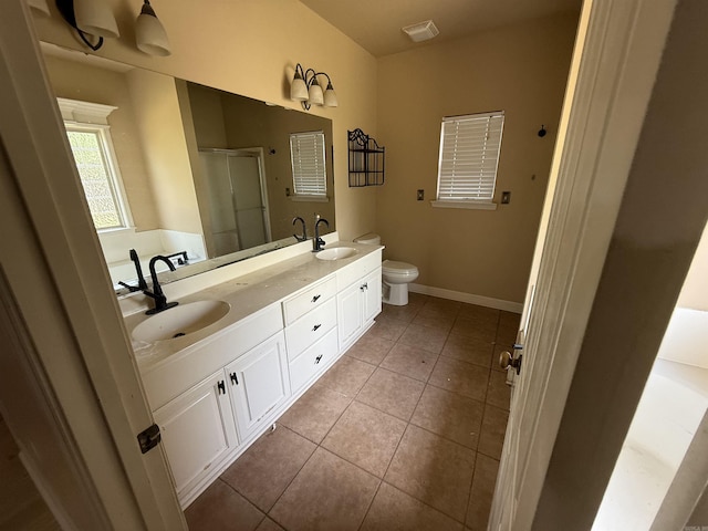 13506 Dynasty Dr, Alexander, AR 72002 - bathroom featuring a stall shower, tile patterned flooring, visible vents, and a sink