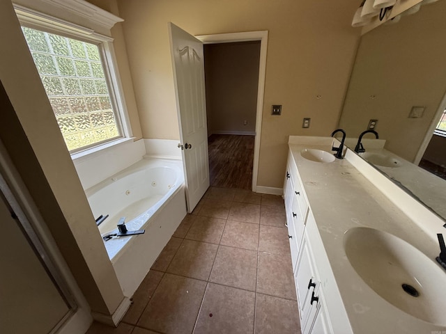 13506 Dynasty Dr, Alexander, AR 72002 - bathroom with a sink, double vanity, and tile patterned floors