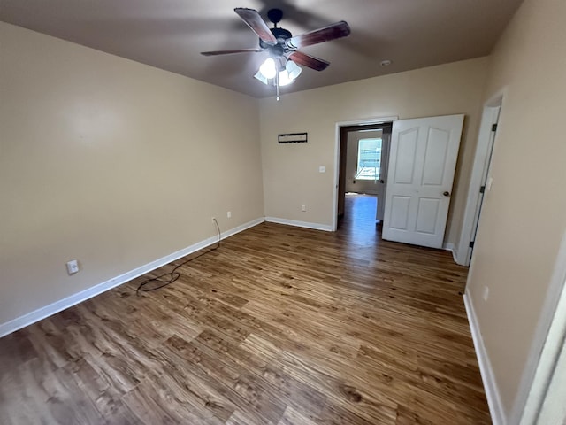 13506 Dynasty Dr, Alexander, AR 72002 - unfurnished room featuring baseboards, ceiling fan, and wood finished floors