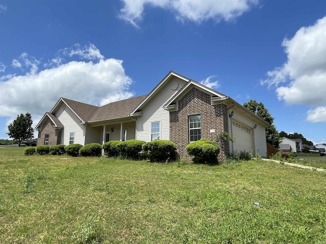 13506 Dynasty Dr, Alexander, AR 72002 - ranch-style home with a garage, a front lawn, and brick siding