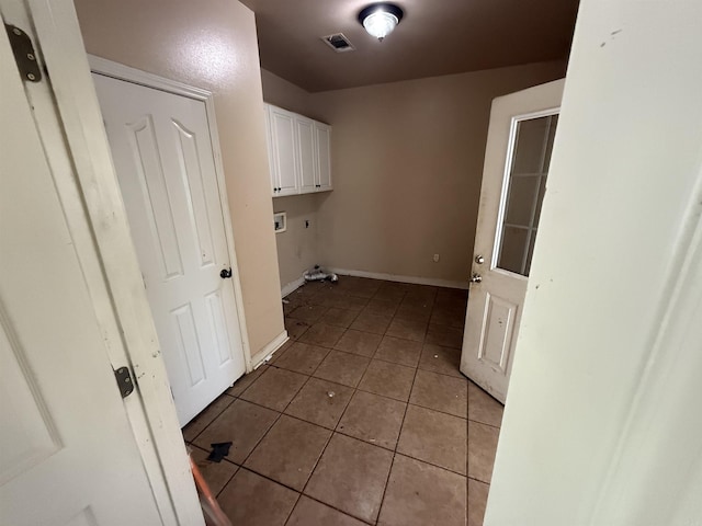 13506 Dynasty Dr, Alexander, AR 72002 - clothes washing area featuring cabinet space, visible vents, light tile patterned floors, washer hookup, and baseboards