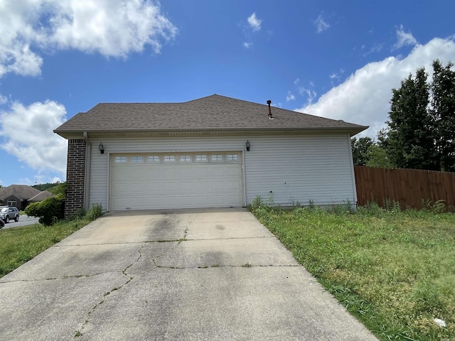 13506 Dynasty Dr, Alexander, AR 72002 - view of home's exterior featuring fence, an attached garage, and concrete driveway