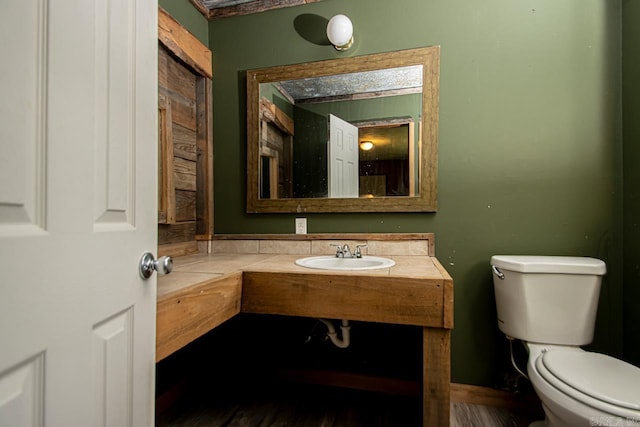 1400 S Rose St, Sheridan, AR 72150 - bathroom featuring toilet and a sink